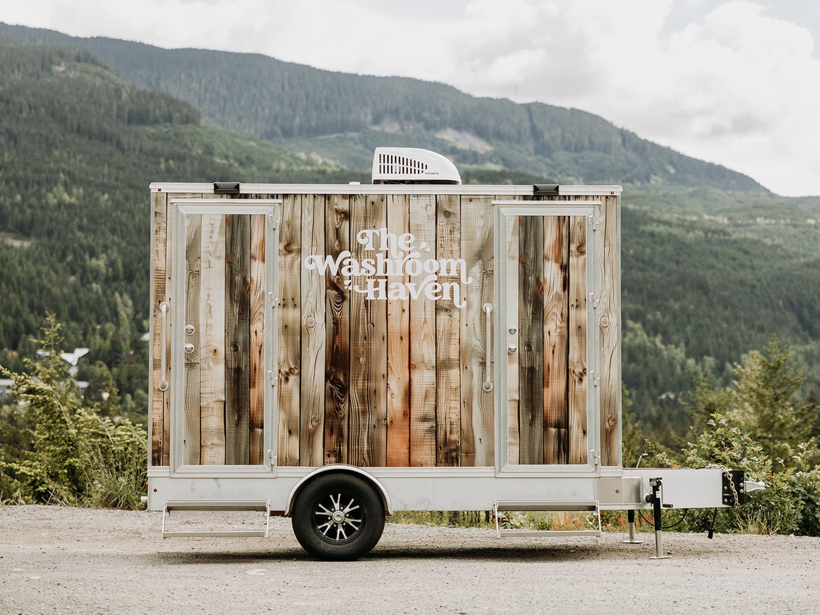 The Washroom Haven trailer set in the Sea to Sky mountains